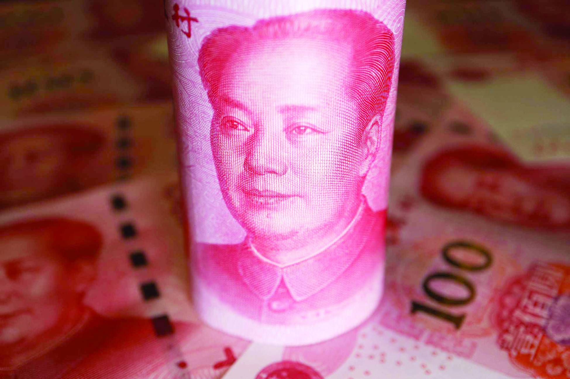 خفض التصنيف الائتماني للصين إلى «سلبي»