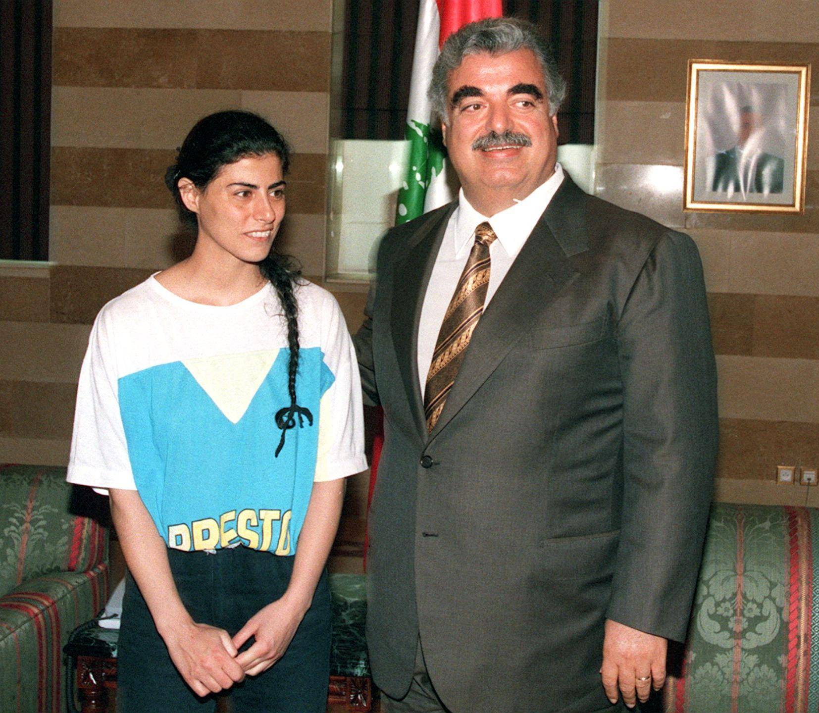 رفيق الحريري مستقبلاً سهى بشارة (أ.ف.ب)