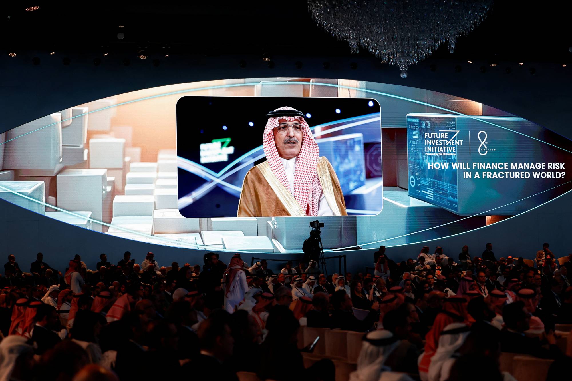 وزير المالية السعودي محمد الجدعان متحدثاً في خلال نسخة العام الماضي من المؤتمر (رويترز)