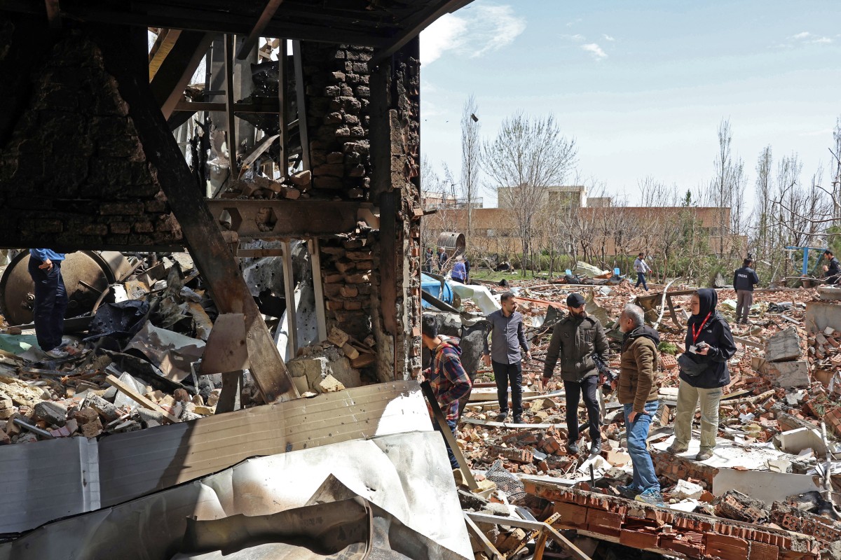 ABD ve İsrail'in saldırısı sonucu İran'ın başkenti Tahran'da meydana gelen yıkımın bir görüntüsü (AFP)