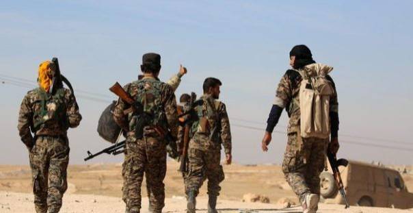  SDG mensupları, Suriye'nin kuzeydoğusunda (AFP)