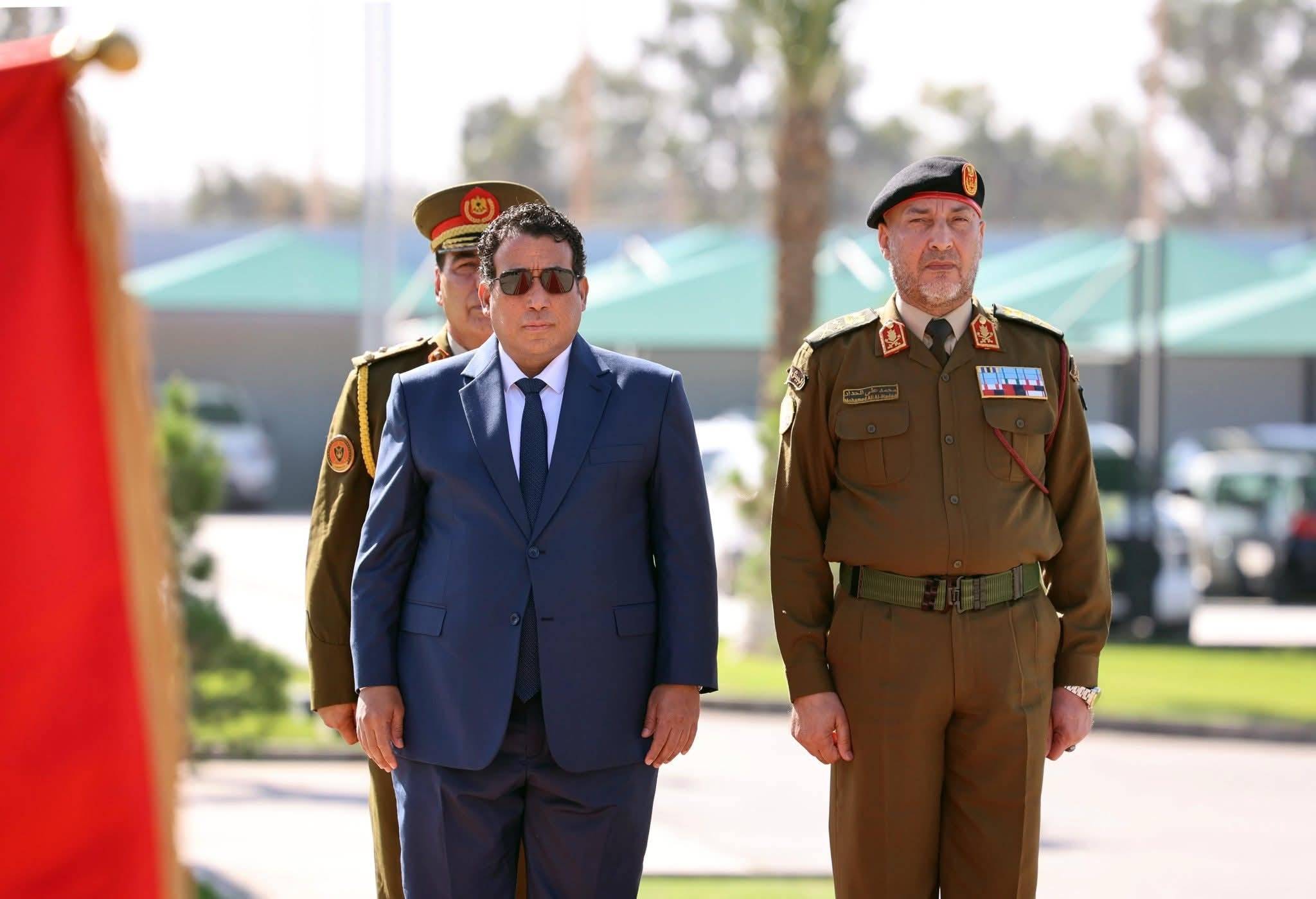 Geçen ay Trablus'ta yapılan toplantı öncesinde el-Menfi'nin yanında duran el-Haddad (Başkanlık Konseyi)