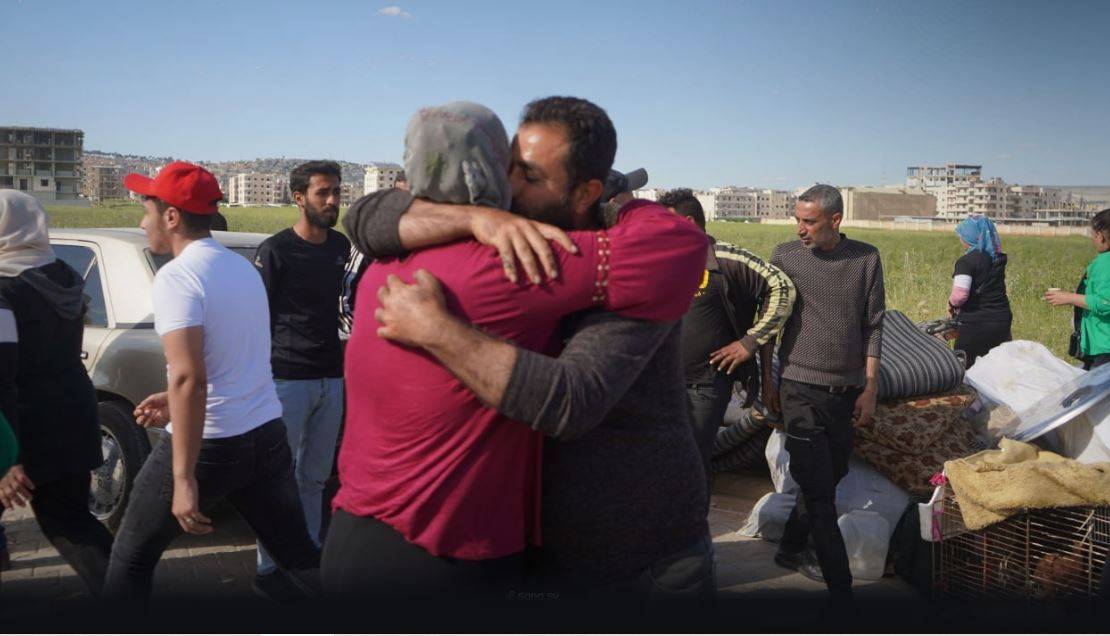Afrin'de (SANA) yerinden edilen Suriyeli aile yeniden bir araya geldi