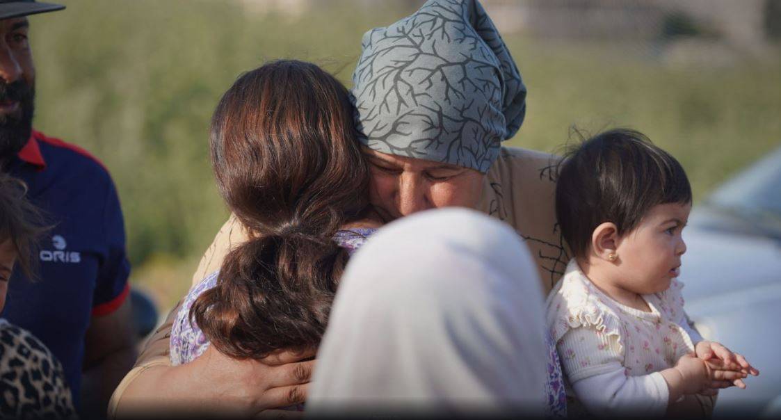 Kobani'nin Ayn el-Arab şehrinden gelen ve yaklaşık 600 ailenin yer aldığı ilk gruptaki Suriyeliler (SANA)