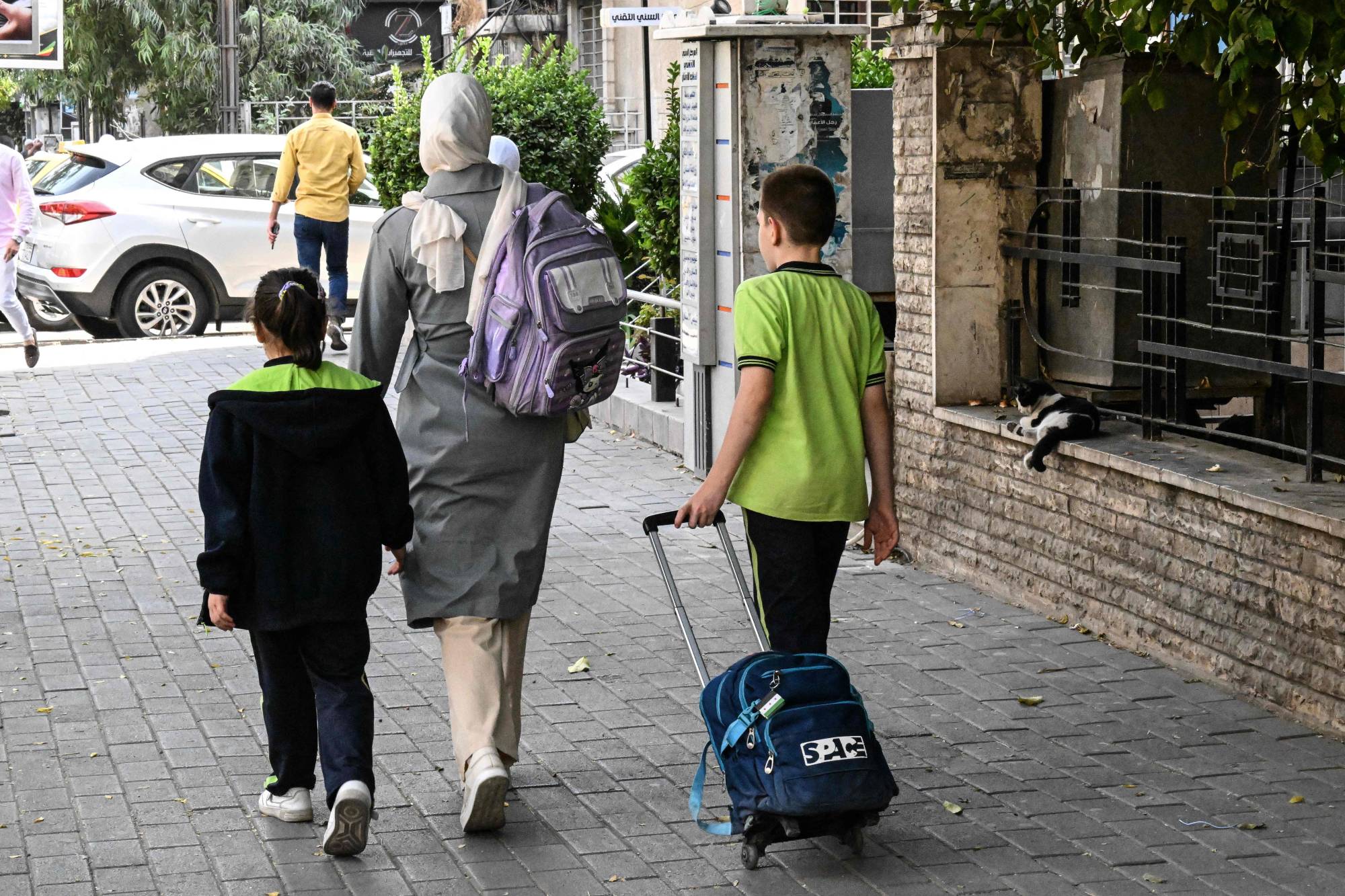 Şam’da okul çıkışı evlerine dönen çocuklar. (AFP)