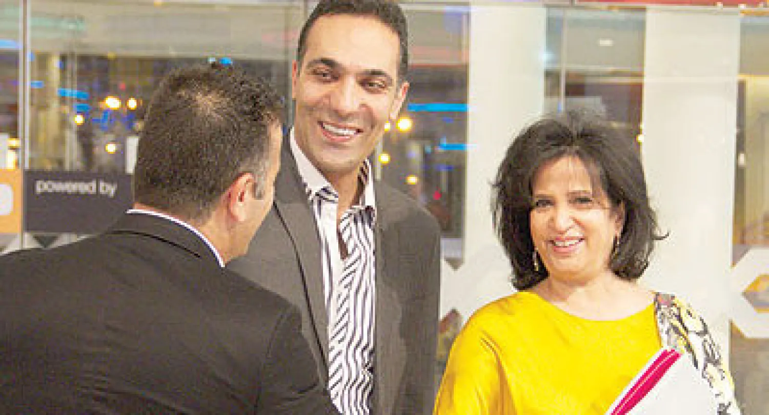 الشيخة مي بنت محمد آل خليفة مع الدكتور إيلي فلوطي رئيس اللجنة التنظيمية، أثناء افتتاح مهرجان «تاء الشباب 5»