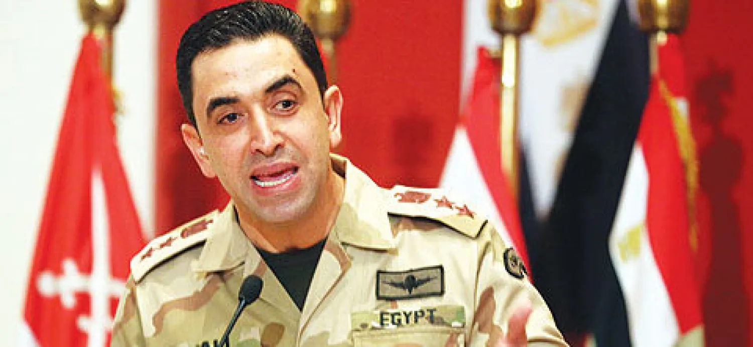 المتحدث العسكري العقيد أحمد علي في مؤتمر صحافي في القاهرة أمس (إ.ب.أ)