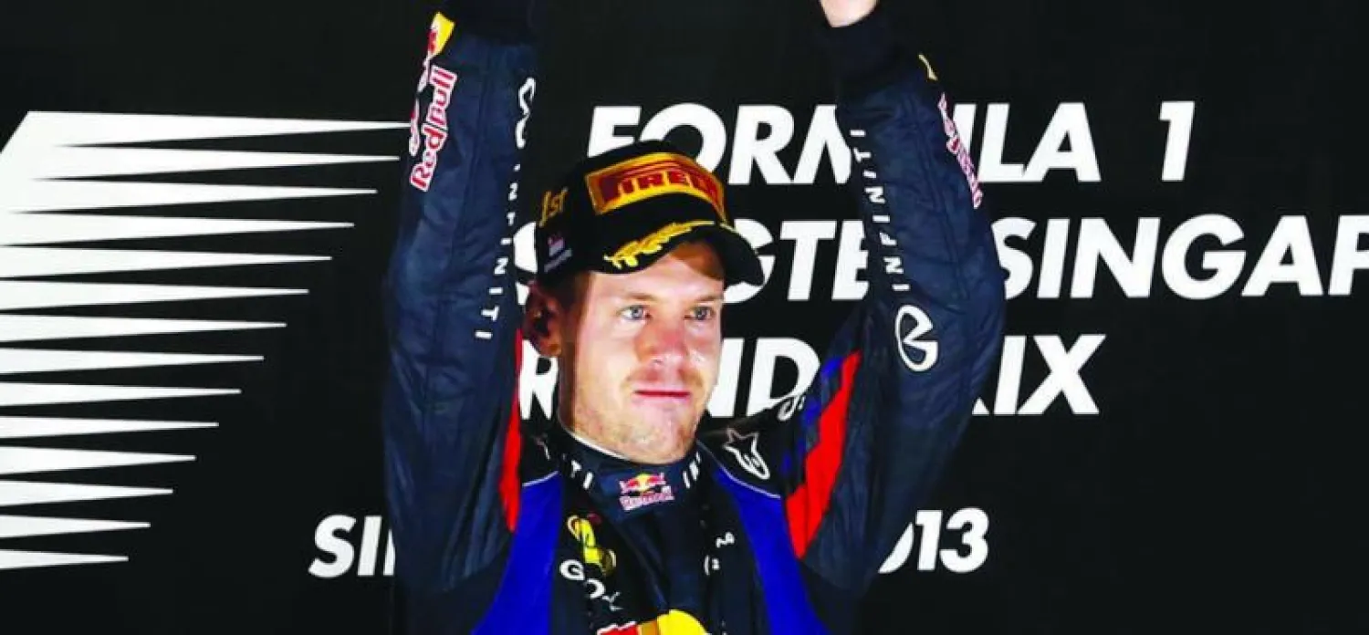 فيتيل يتوج بطلا لسباق سنغافورة للمرة الثالثة على التوالي
