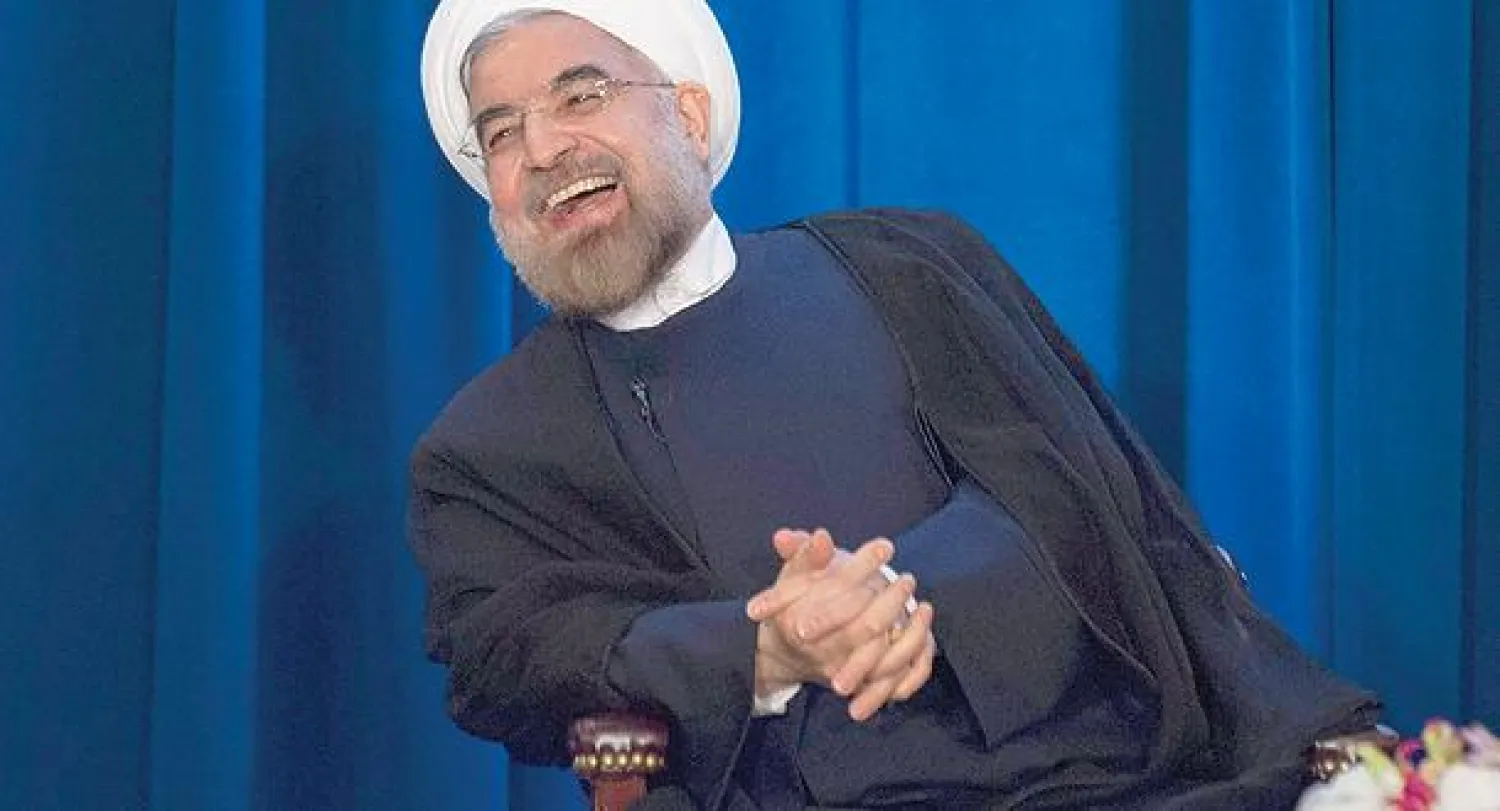 الرئيس الإيراني حسن روحاني أثناء حضوره مؤتمرا نظمه {مجلس العلاقات الخارجية ومجتمع آسيا} في نيويورك أول من أمس (رويترز)