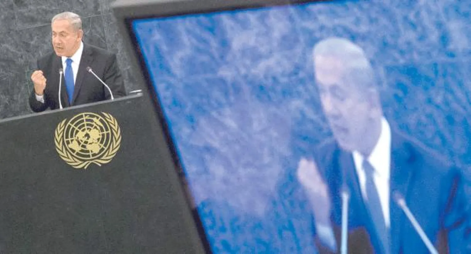 رئيس الوزراء الإسرائيلي بنيامين نتنياهو خلال إلقائه خطاب إسرائيل  أمام الجمعية العامة للأمم المتحدة في نيويورك أمس (رويترز)