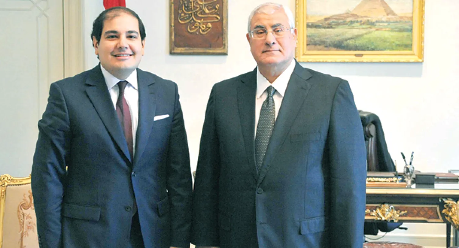 الرئيس المصري عدلي منصور والدكتور عادل الطريفي رئيس تحرير {الشرق الأوسط}