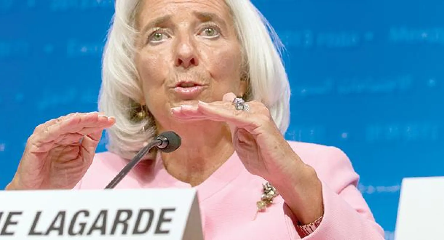 كريستين لاغارد رئيسة صندوق النقد الدولي تتحدث خلال اجتماعات البنك الدولي وصندوق النقد السنوية في واشنطن أمس (أ. ب)