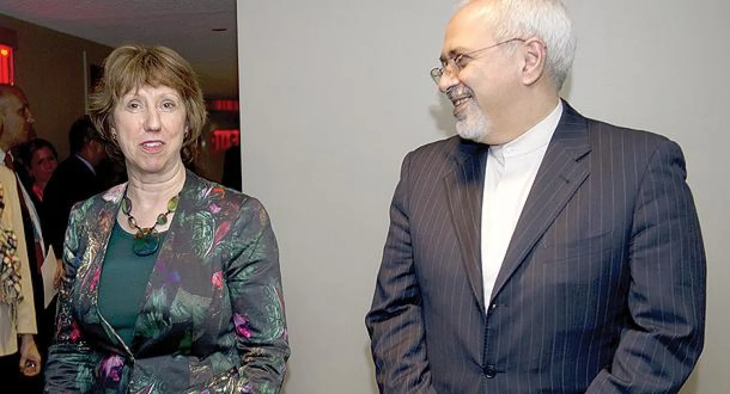 كاثرين آشتون ومحمد جواد ظريفي في اجتماعات الأمم المتحدة أواخر سبتمبر الماضي (أ.ف.ب)