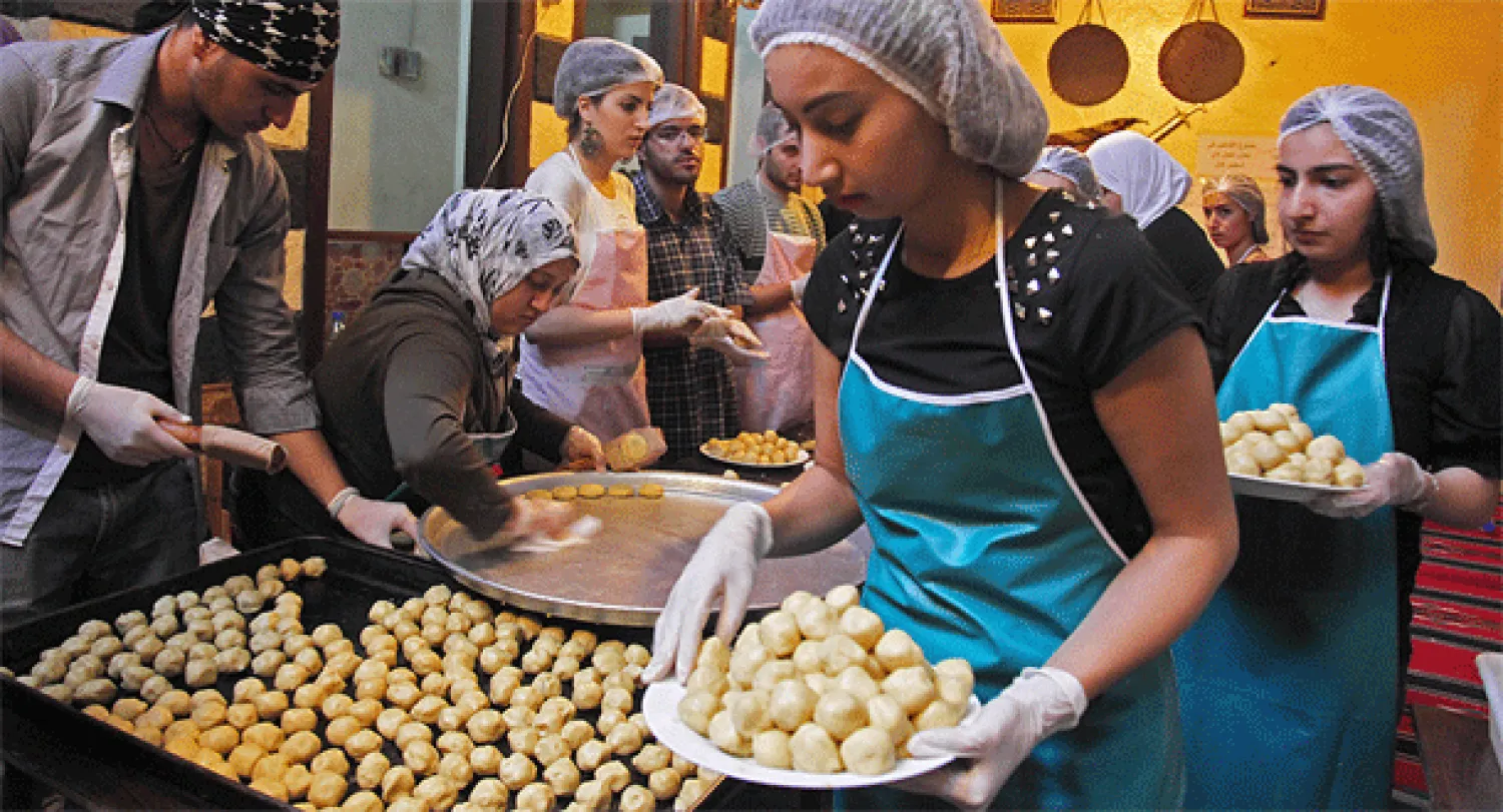 متطوعون سيوزعون حلوى العيد في دمشق رغم الأزمة