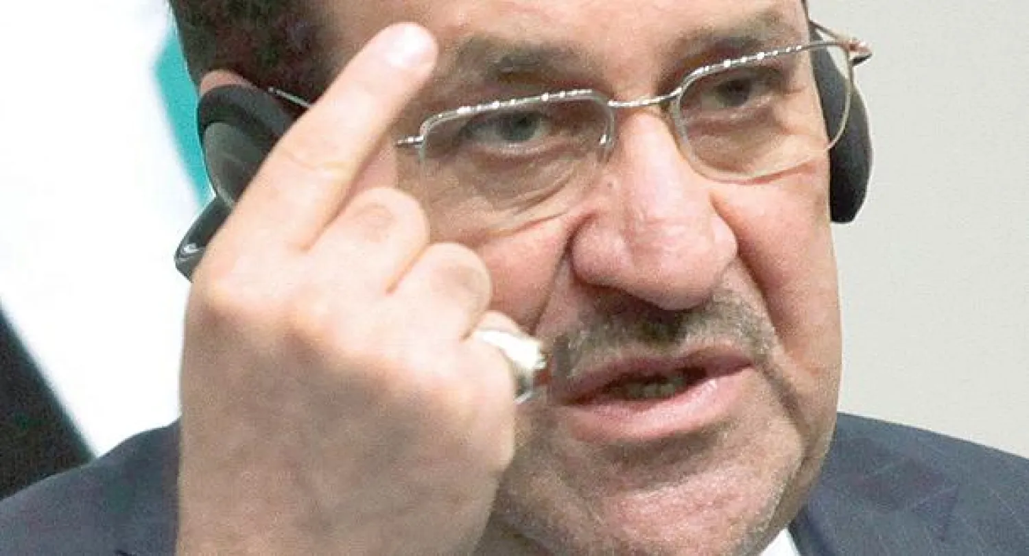 نوري المالكي، رئيس الحكومة العراقية،  في معهد السلام بواشنطن أمس (رويترز)