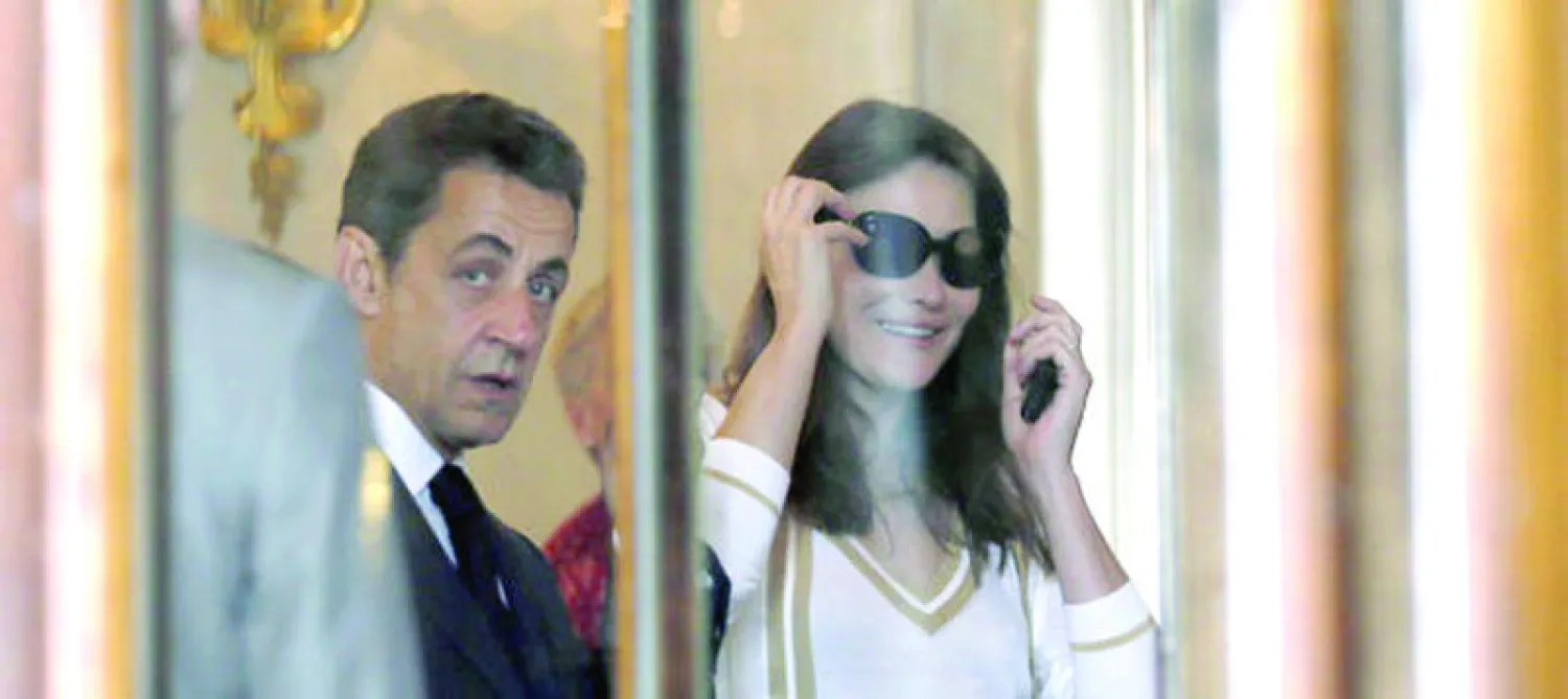 مصورة جزائرية تتسلل إلى خلوة ساركوزي وكارلا