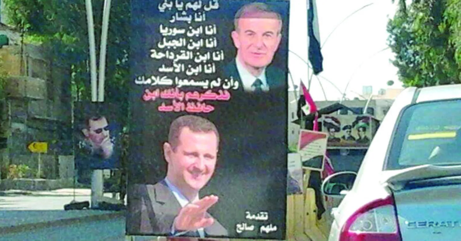 تنتشر صور الرئيس السوري بشار الأسد في شوارع دمشق  ضمن حملة لإعادة ترشيحه لولاية ثالثة («الشرق الأوسط»)