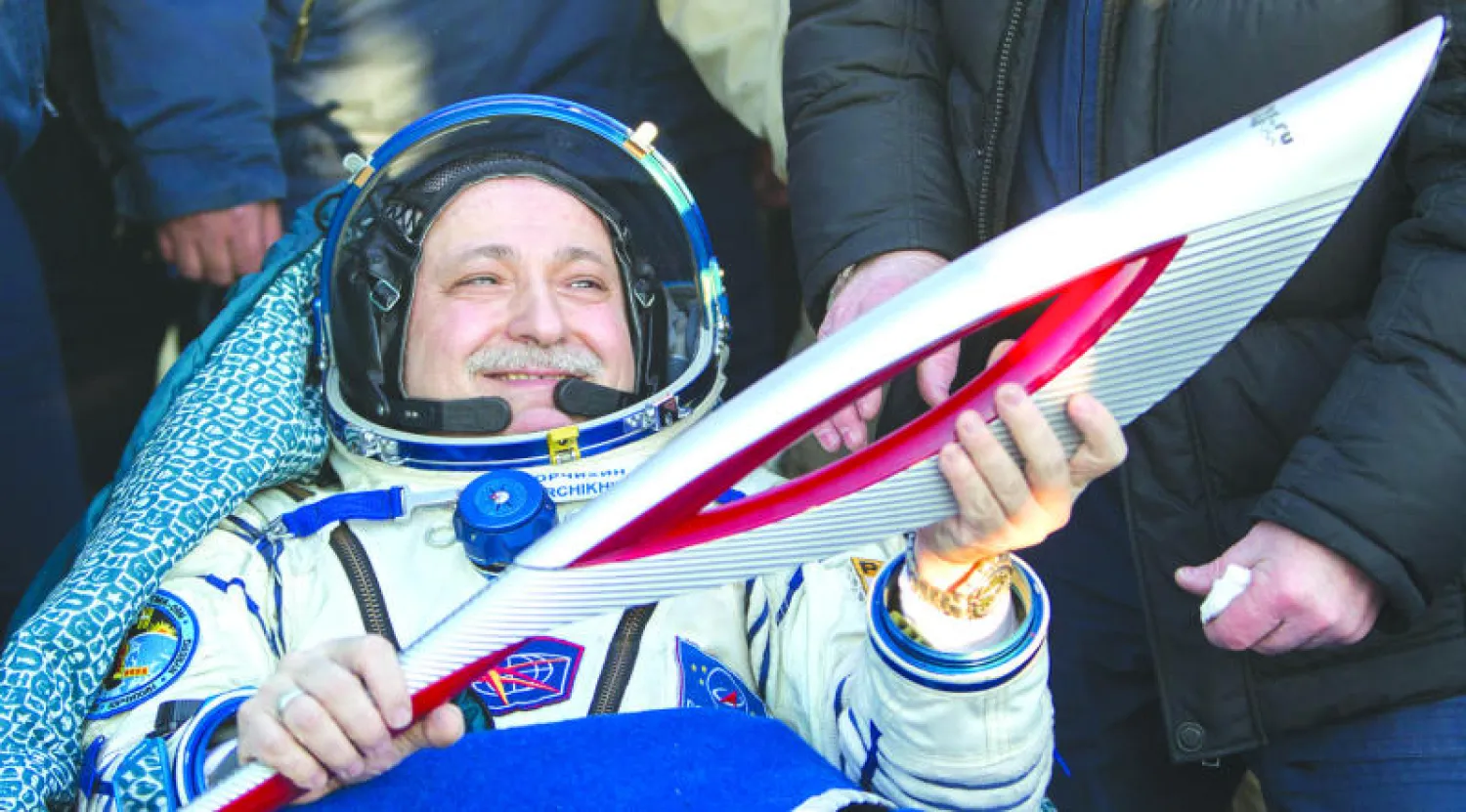 الشعلة الأولمبية الروسية تعود إلى الأرض