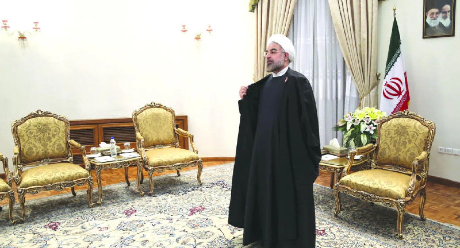 حسن روحاني في مكتبه الرئاسي بطهران (أ.ب)