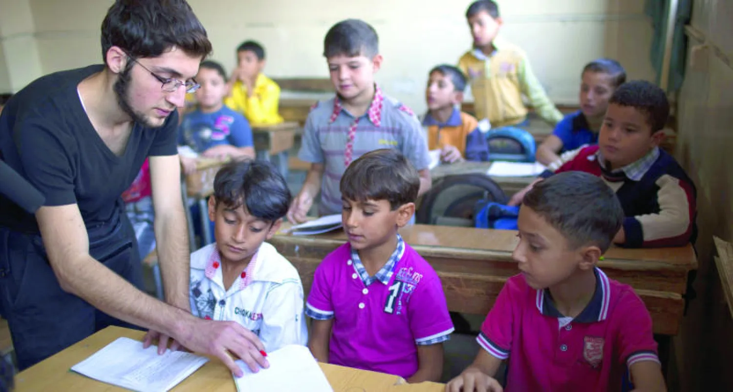 الائتلاف الوطني ينفي علاقته بكتب مدرسية تحمل صور معاذ الخطيب