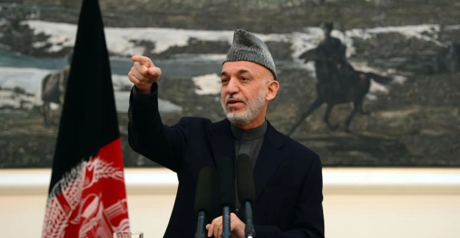 الرئيس الأفغاني حميد كرزاي في المؤتمر الصحافي بالعاصمة كابل (أ.ف.ب)