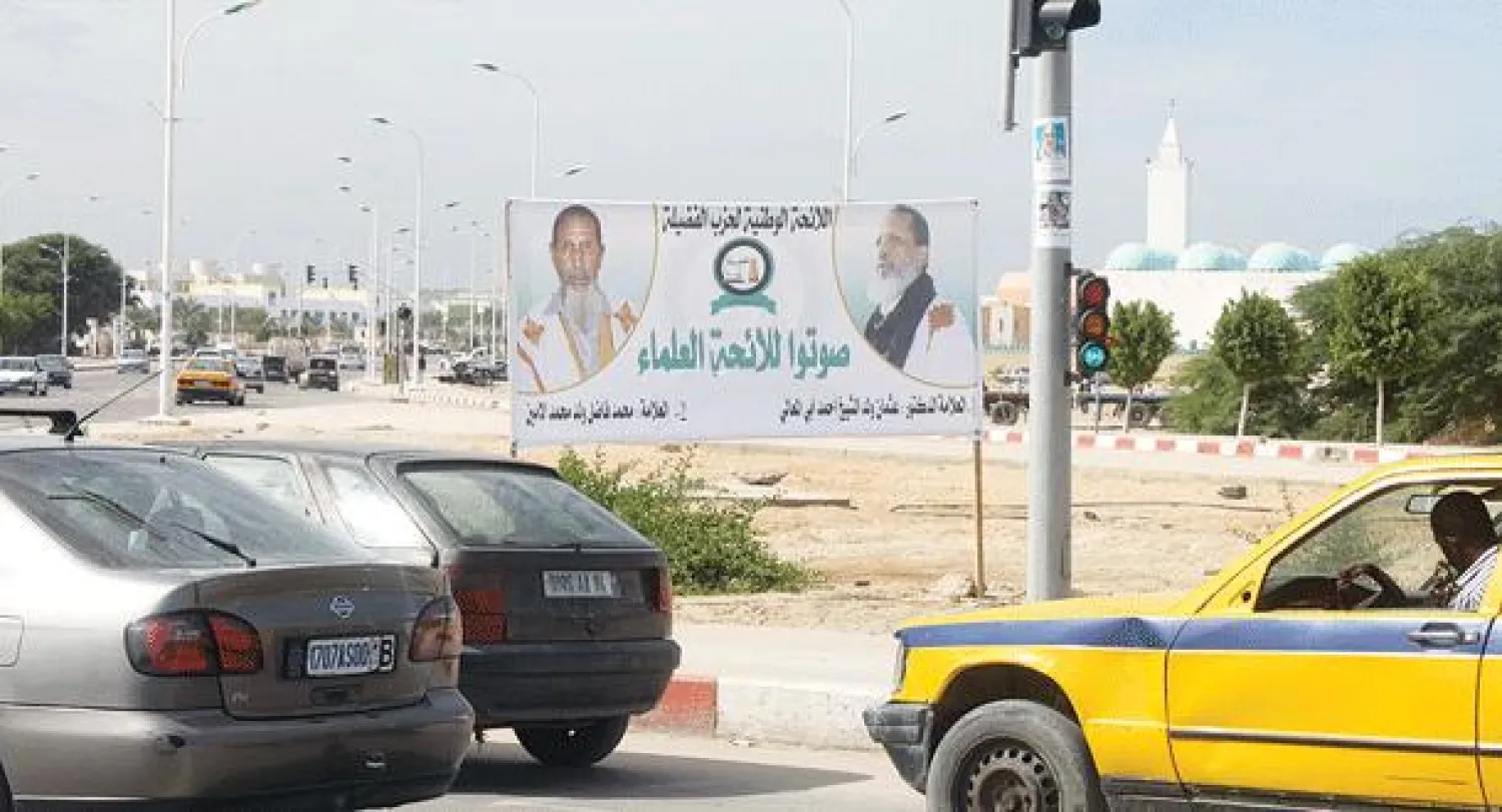 لوحة إعلانية للائحة انتخابية سمت نفسها لائحة العلماء («الشرق الأوسط»)