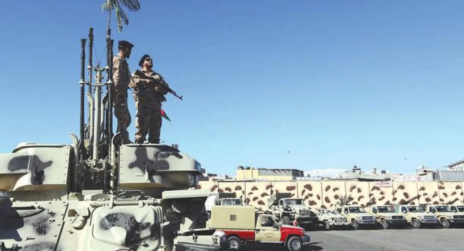 عناصر وعتاد ميليشيا لواء القعقاع تستعد لإخلاء مواقعها في العاصمة طرابلس استجابة لقرار السلطات الليبية (أ.ف.ب)