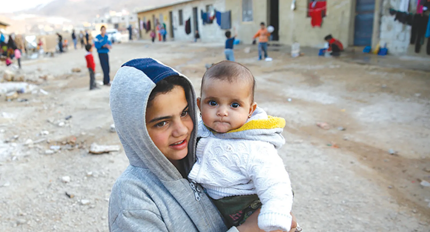 عرسال تفتح ذراعيها لاحتضان عشرات الآلاف من اللاجئين السوريين بينهم أطفال ونساء وشيوخ   