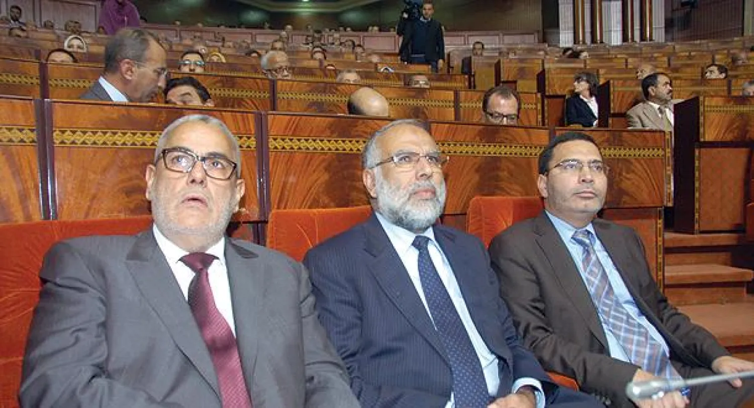 عبد الإله ابن كيران رئيس الحكومة المغربية وعبد الله باها وزير الدولة ومصطفى الخلفي وزير الاعلام يستمعون الى مداخلات الندوة  خلال جلسة المساءلة النيابية الشهرية أمس (تصوير: مصطفى حبيس)