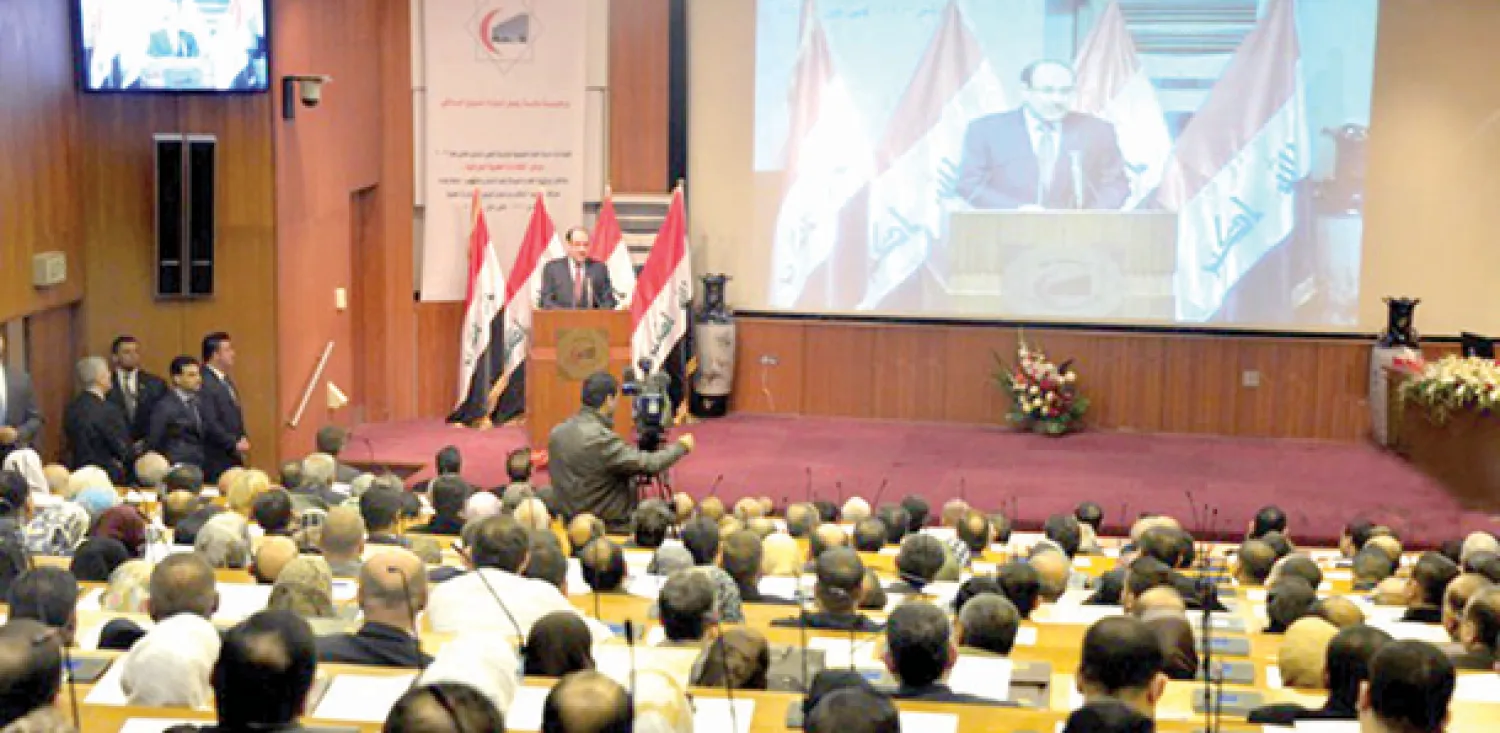 صورة من موقع رئاسة الوزراء العراقية لرئيس الوزراء نوري المالكي وهو يلقي كلمة في مؤتمر الكفاءات الطبية العراقية في بغداد أمس
