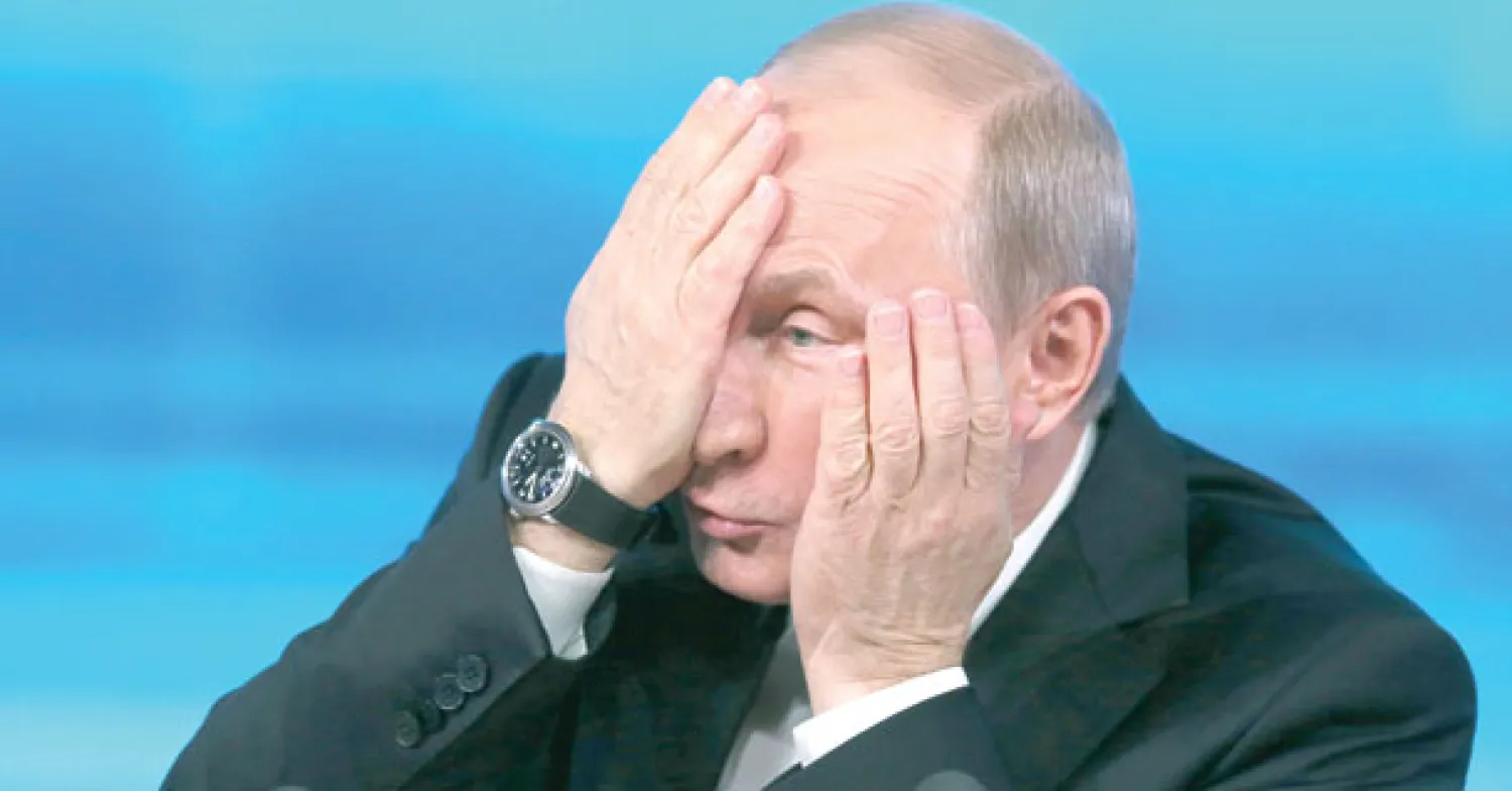 بوتين يرد على الأسئلة خلال مؤتمره الصحافي السنوي في موسكو أمس (إ.ب.أ)