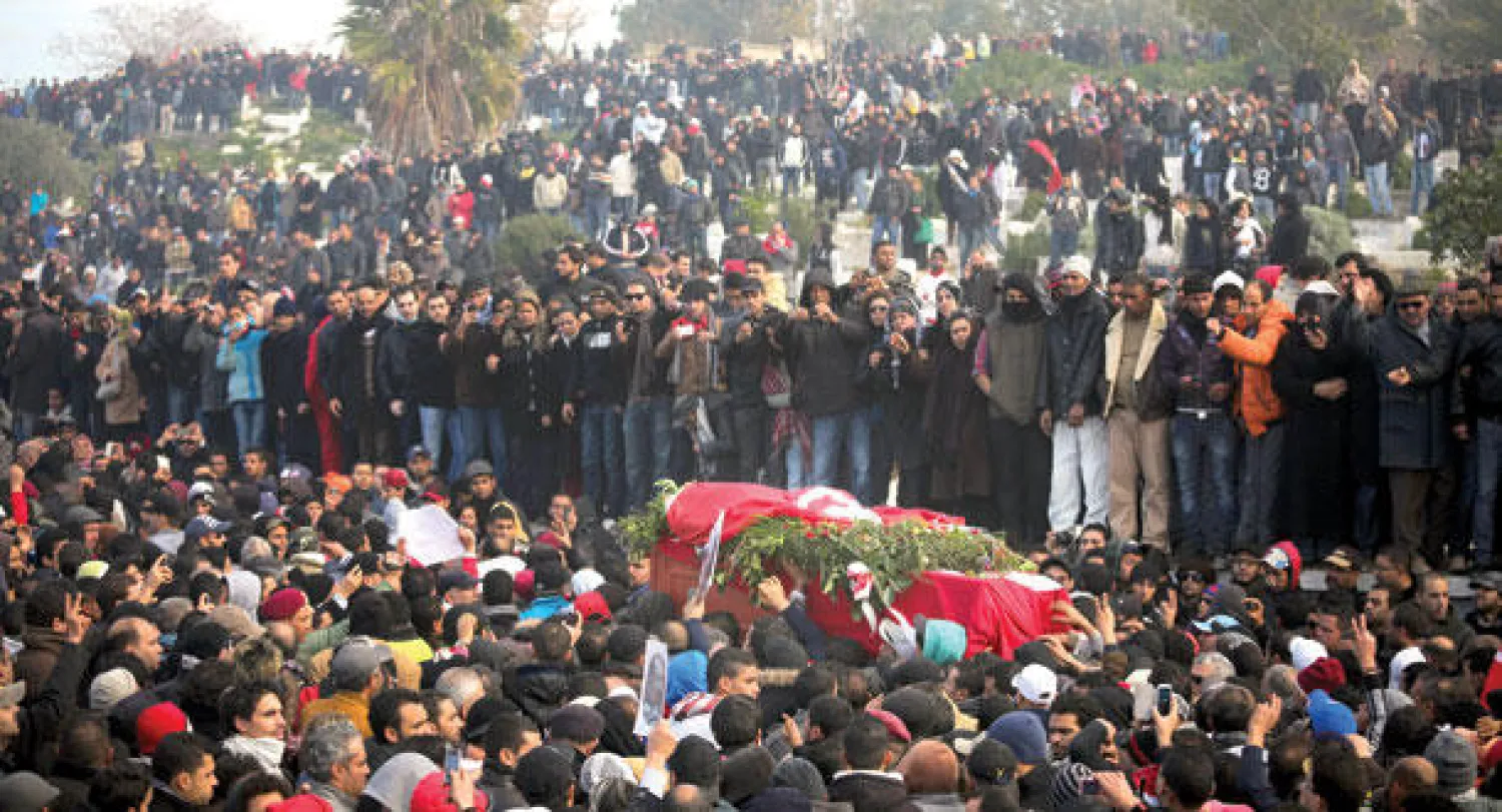 جنازة شكري بلعيد في تونس يوم 18 فبراير(شباط) الماضي بعد اغتياله (نيويورك تايمز)