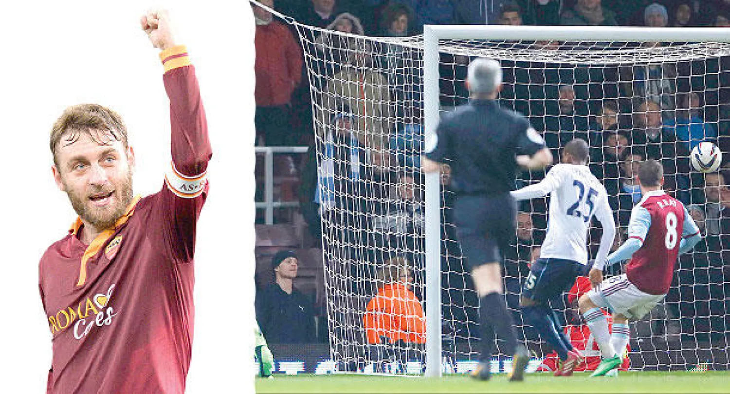 نيغريدو نجم سيتي (على الأرض أقصى اليسار) يتابع تسديدته وهي في طريقها لشباك وستهام (رويترز) و دي روسي نجم روما يحتفل بفوز فريقه  على يوفنتوس