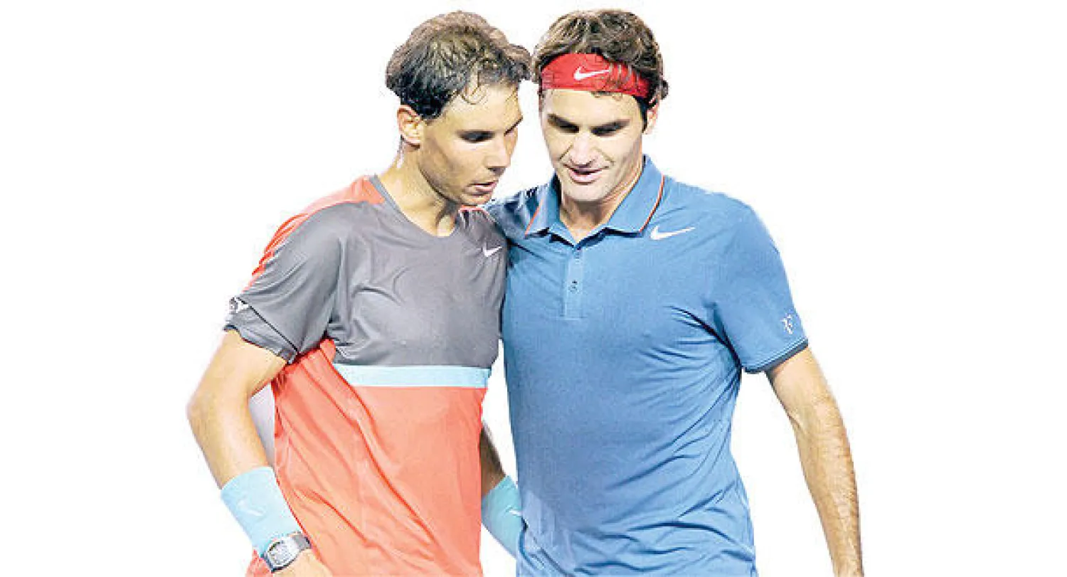 نادال (يسار) يؤكد تفوقه على فيدرر ويبلغ النهائي للمرة الثالثة (أ.ب)