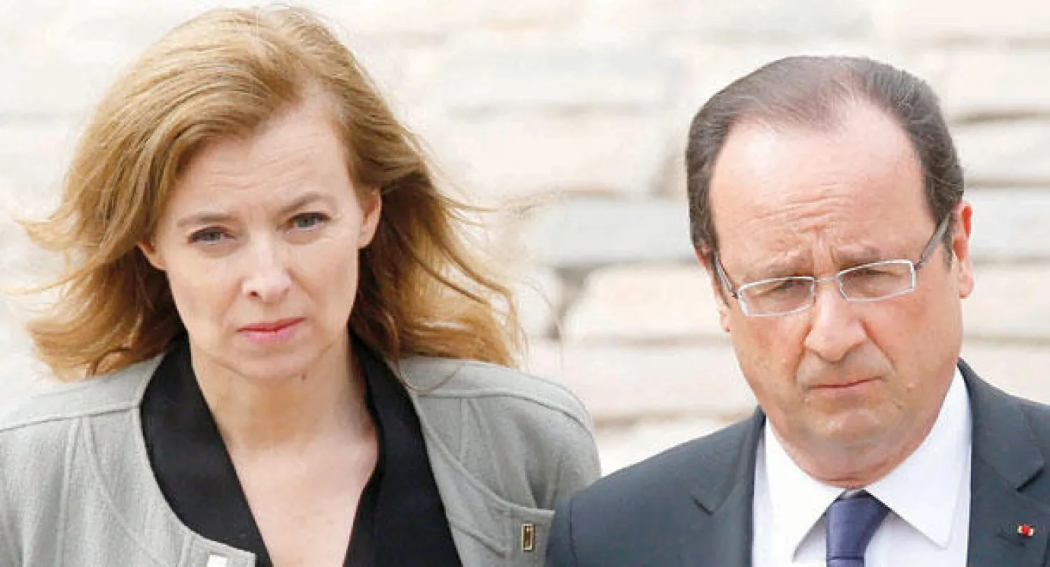 صورة لهولاند وتريرفيلر قبل انفصالهما (رويترز)