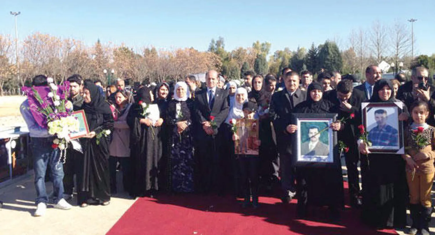 جانب من مراسم جرت أمس لإحياء الذكرى السنوية العاشرة  لتفجيرين انتحاريين في مقري الحزبين الرئيسين  في أربيل عاصمة إقليم كردستان العراق («الشرق الأوسط»)