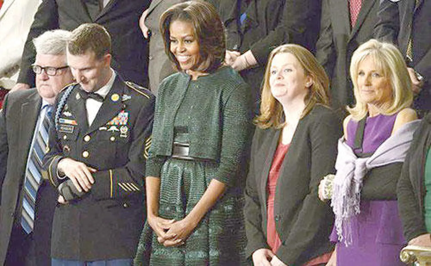 ميشيل أوباما مرتدية الزي الذي صممه عز الدين علية