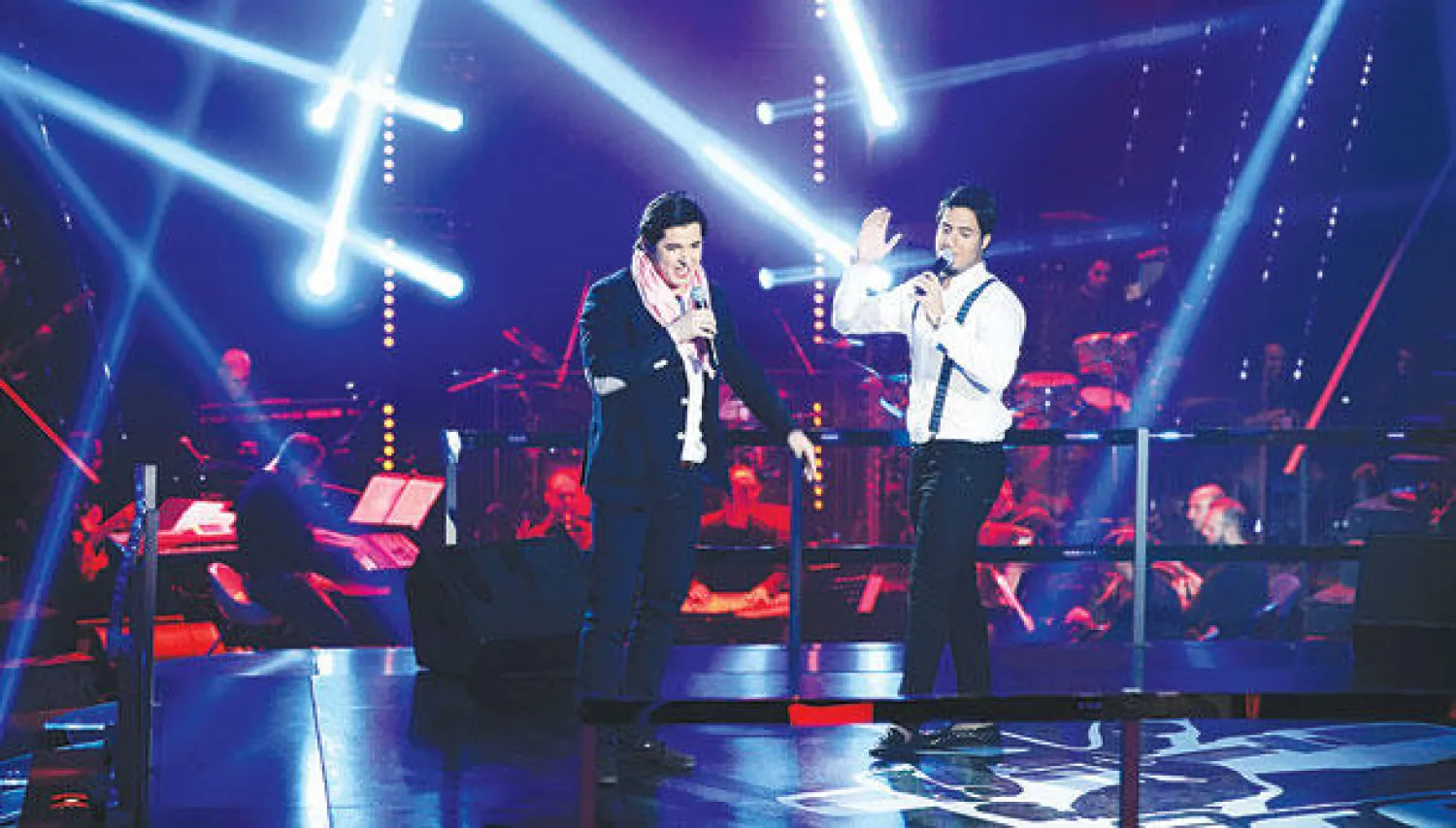 السعودي محمد هاشم والعراقي كرارصلاح  في حلبة المواجهة الغنائية