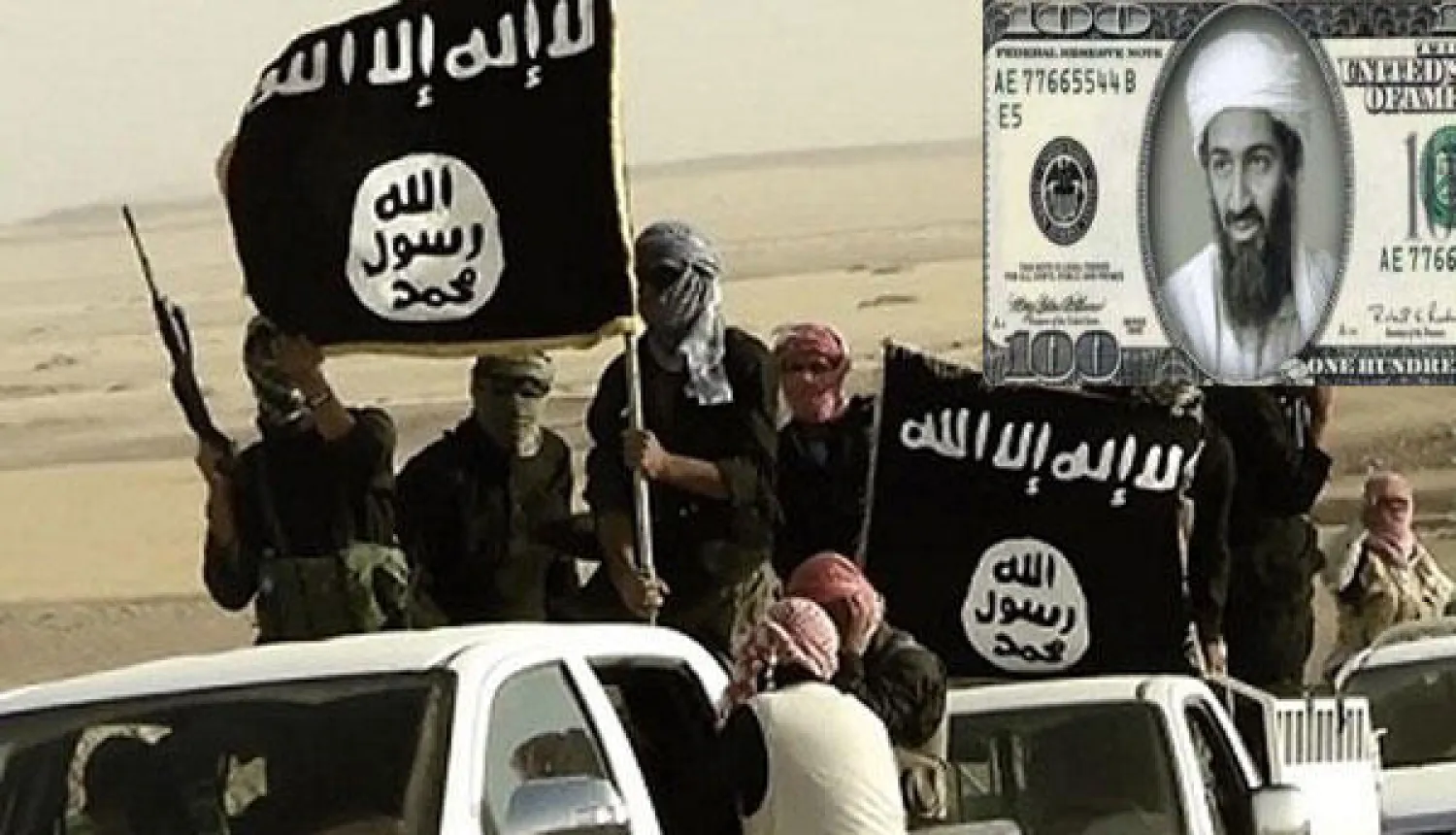 «داعش» تطبع عملة نقدية تحمل صورة بن لادن وبرجي التجارة.. ومحافظ الأنبار يرفض التفاوض معهم