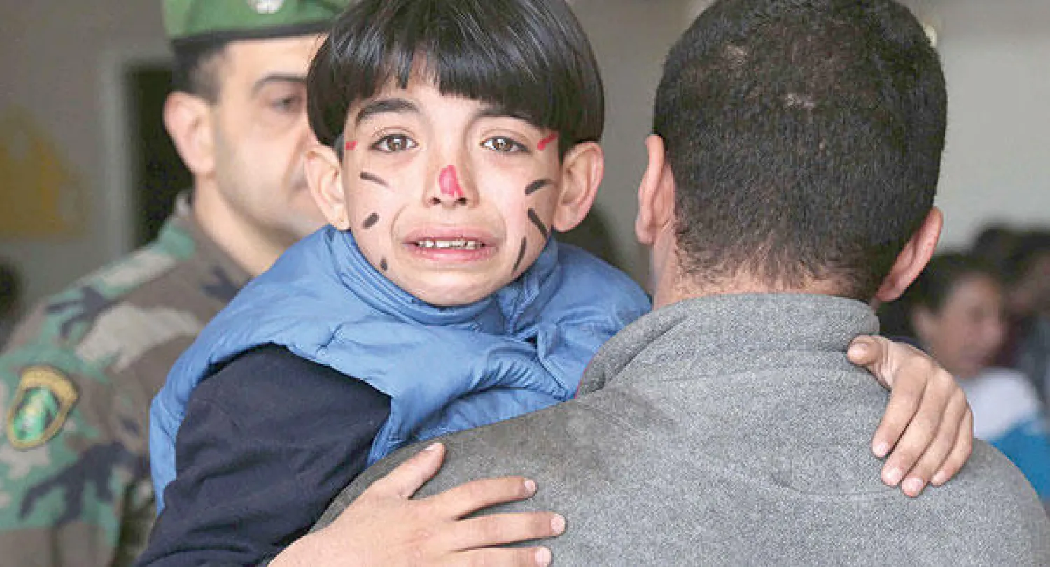 كثير من جرحى التفجير المزدوج هم من أطفال دار أيتام يقع قرب المركز الثقافي الإيراني (أ.ف.ب)