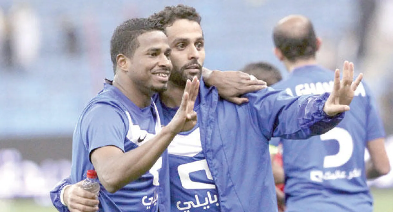 ياسر القحطاني وناصر الشمراني يشيران بالأربعة بعد الفوز على النصر في الديربي أمس الأول (تصوير: مشعل القدير)