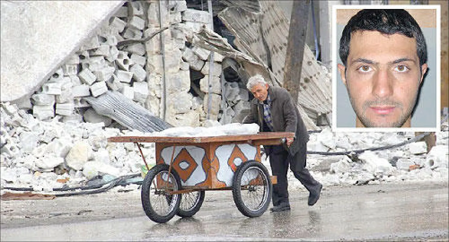 سوري يدفع عربة وسط الأنقاض في مدينة حلب أمس (أ.ف.ب).. وفي الإطار صورة يعتقد أنها لزعيم جبهة النصرة أبو محمد الجولاني (أ.ب)