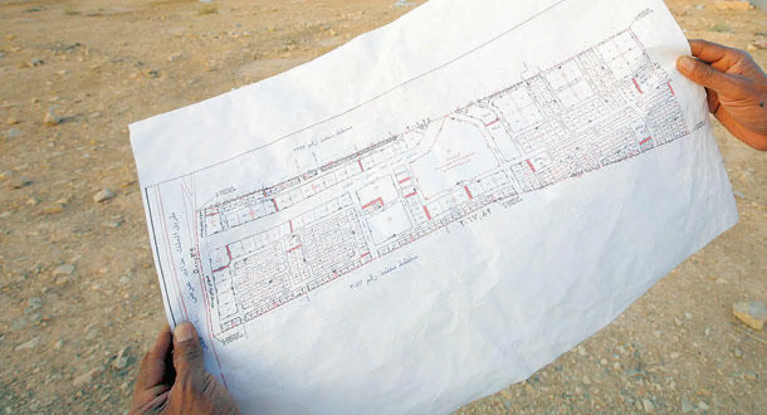 تعاون جرى بين وزارة الإسكان وبقية الجهات الحكومية للتوصل إلى آلية استحقاق متزنة ({الشرق الأوسط})