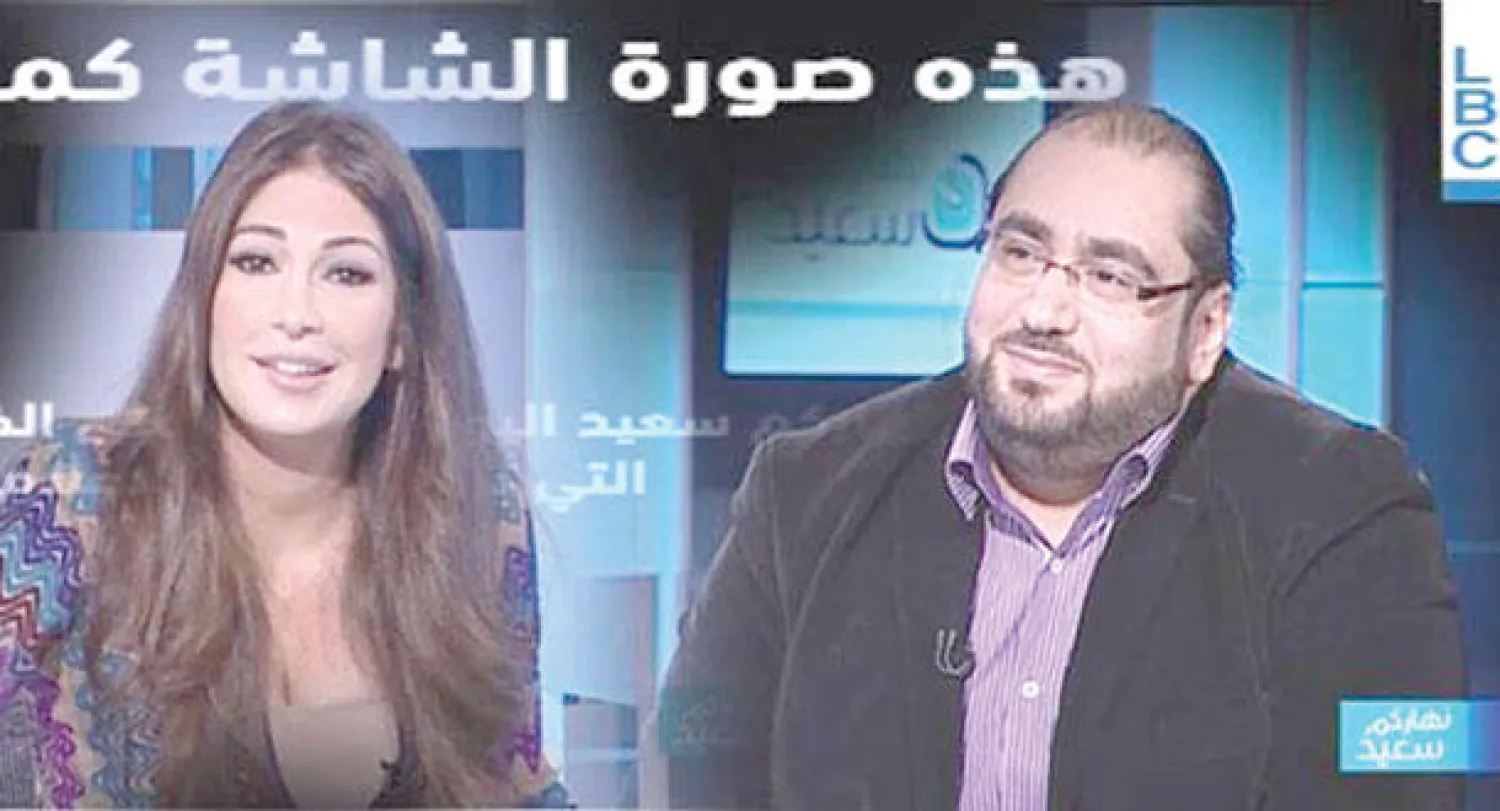 المقدمة ديما صادق مع الناشط عماد بزي