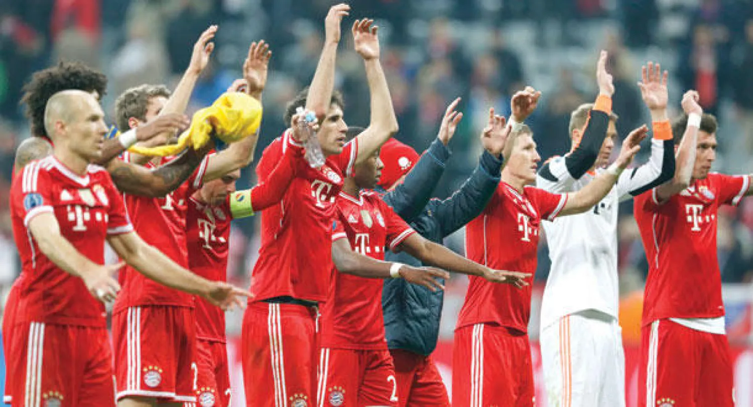 لاعبو بايرن ميونيخ يتأهبون للاحتفال بالاحتفاظ باللقب (أ.ب)