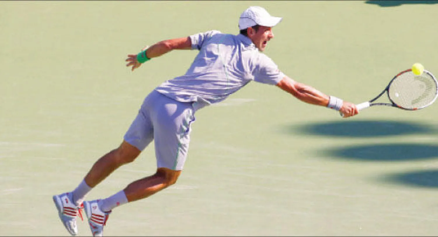 الصربي نوفاك ديوكوفيتش في مباراته أمام الفرنسي (إ.ب.أ)