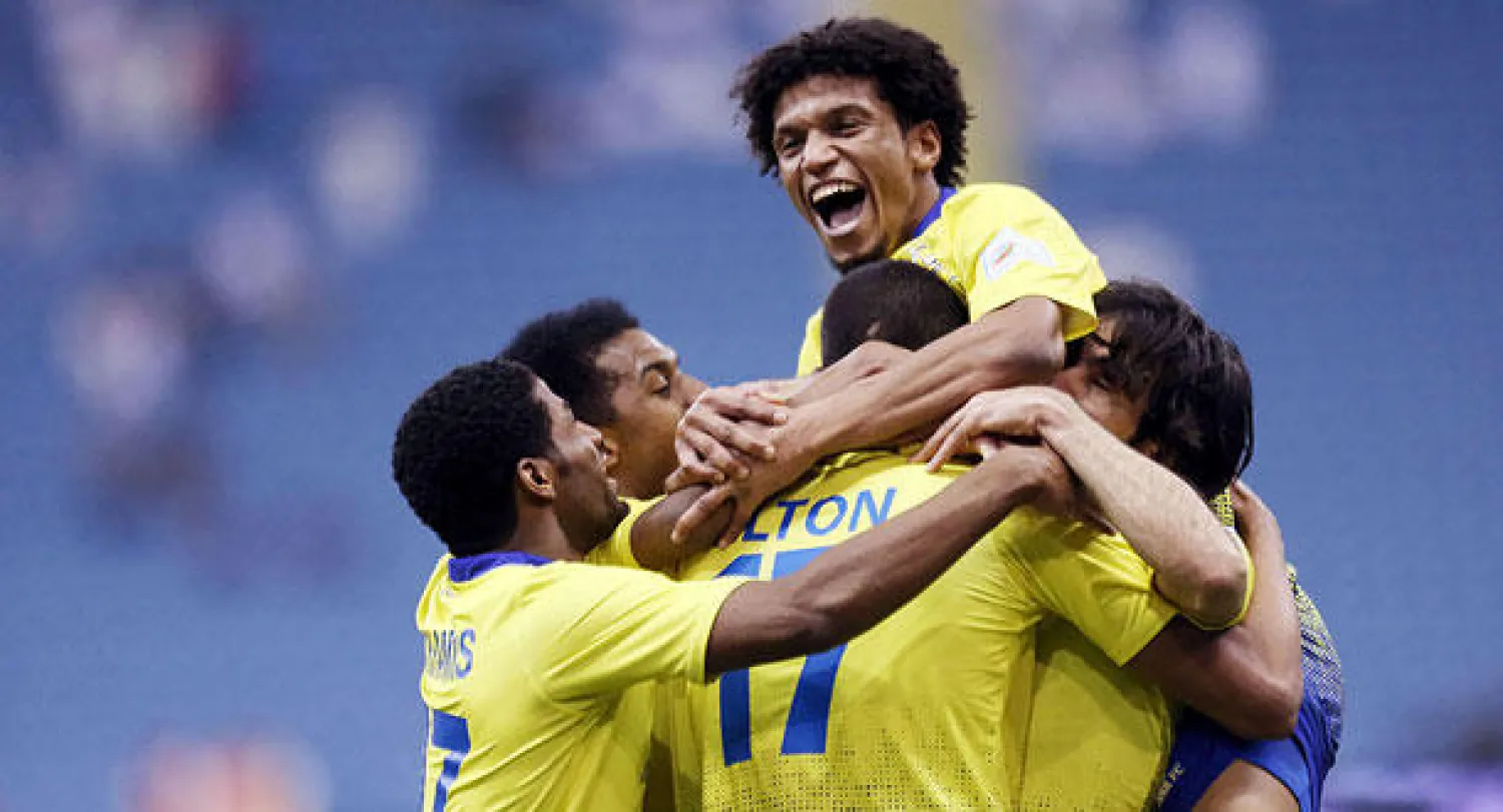 لاعبو النصر يحتفلون بأحد أهدافهم في الاتحاد (تصوير: عبد العزيز النومان)