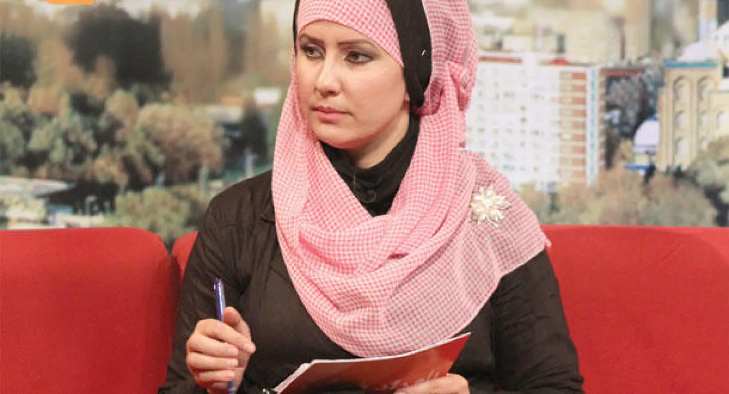 إحدى مذيعات البرامج الحوارية في {تولو تي في}