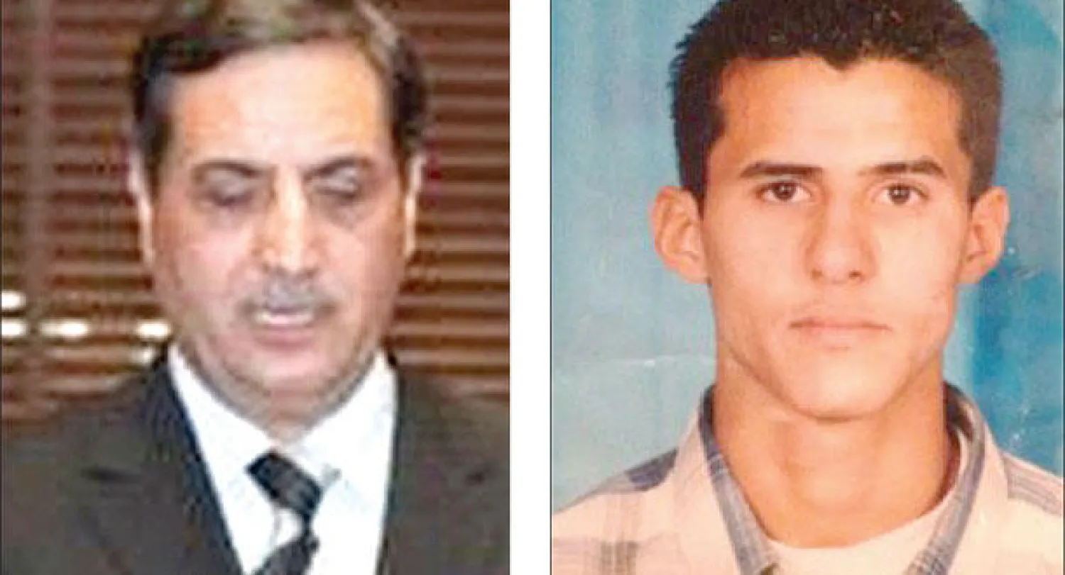 السجين الليبي المعتقل في عمان محمد الدرسي  و السفير الأردني فواز العيطان