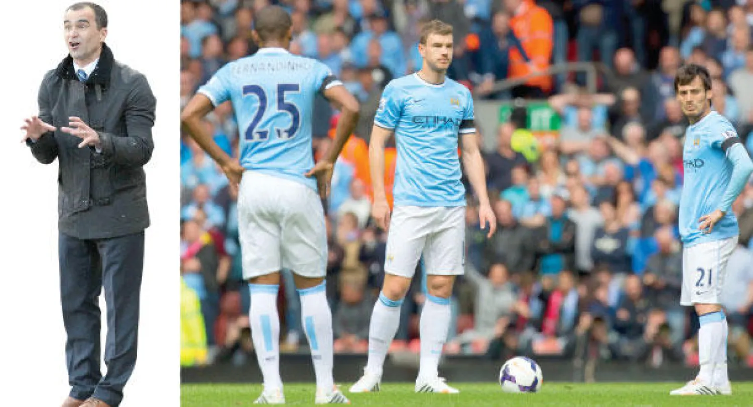 سيلفا ودزيكو وفيرناندينيو نجوم مانشستر سيتي مطالبون اليوم بفعل الكثير (أ.ب)  -  مارتينيز مدرب إيفرتون